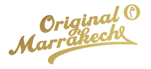 Logo of the company Original Marrakech in golden letters.